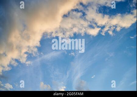 Blue sky at sunset with dramatics clouds Stock Photo