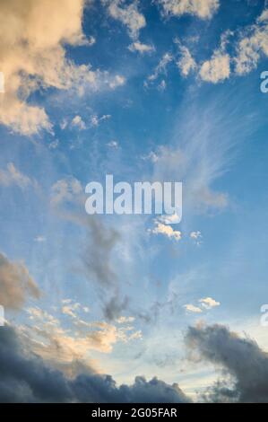 Blue sky at sunset with dramatics clouds Stock Photo