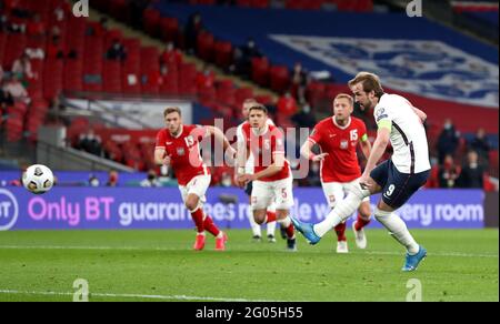File photo dated 31-03-2021 of England's Harry Kane scoring their side's first goal against Poland during the 2022 FIFA World Cup Qualifying match at Wembley Stadium, London. Issue date: Tuesday June 1, 2021. Stock Photo