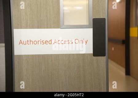 Authorised access only sign on a door in a hospital Stock Photo