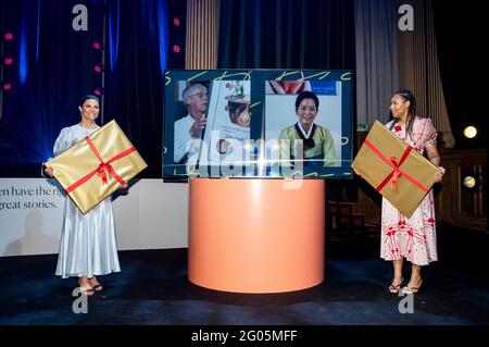 Crown Princess Victoria and host Amie Bramme Sey, on the screen this year's laureate French author  Jean-Claude Mourlevat and last year's laureate South Corean picture book artist Baek Heena at the Alma Award (the Astrid Lindgren Memorial Award) and Swedish Minister of Culture and Democracy Amanda Lind. The Alma Award 2021 is a digital ceremony due to the corona pandemic. Stockholm, Sweden, 31 May 2021 Photo: Christine Olsson / TT / code 10430 Stock Photo