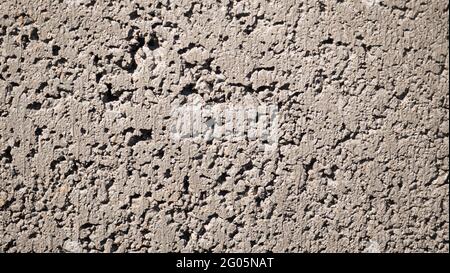 Light grey clay brick and mortar wall in. wallpaper background. Place for text, title Stock Photo