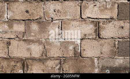 Light grey clay brick and mortar wall in. wallpaper background. Place for text, title Stock Photo