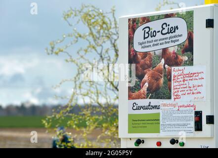 Threna, Germany. 14th Apr, 2021. "Daily fresh from our happy chickens, directly from the region" is written on an egg vending machine for organic eggs in the Leipziger Land. Credit: Volkmar Heinz/dpa-Zentralbild/ZB/dpa/Ģ����ý Live News Stock Photo