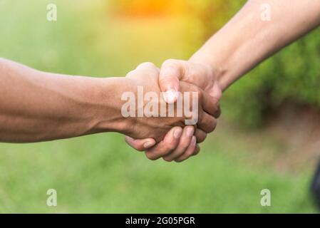 Completion honesty teamwork Concept. Hands of Honest Lawyer Partner promise Professional Team make Law Business Agreement after Complete Deal. Ethics Stock Photo