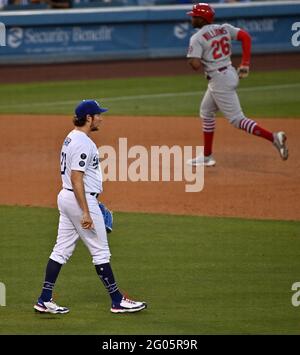 Los Angeles, United States. 01st June, 2021. St. Louis Cardinals' right fielder Justin Williams (26) rounds the bases after pulverizing a solo home-run off Los Angeles Dodgers' starting pitcher Trevor Bauer (L) during the sixth inning at Dodger Stadium in Los Angeles on Monday, May 31, 2021. Photo by Jim Ruymen/UPI Credit: UPI/Alamy Live News Stock Photo