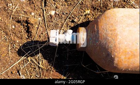 A close up image of an old rusted propane cylinder shut off valve Stock Photo