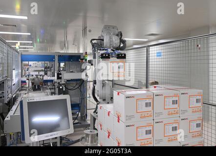 Beijing, China. 01st June, 2021. The robot palletizers are working on the COVID-19 vaccine packaging production line in Beijing, China on 01th June, 2021.(Photo by TPG/cnsphotos) Credit: TopPhoto/Alamy Live News Stock Photo