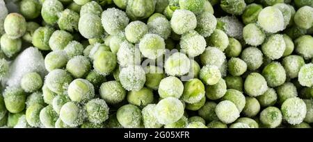 Frozen green peas background Stock Photo