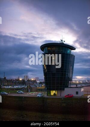 Designed by SMC Parr Architects, the glass clad building of the Marine Operations Centre of the Port of Aberdeen in Scotland, UK - taken at dusk.