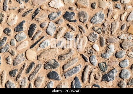 Background of a path made of pebbles Stock Photo