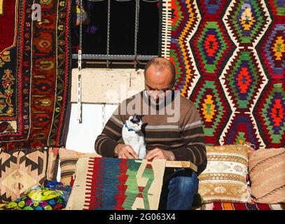 Antalya, Turkey December 22 2018: traditional turkish carpet maker at ancient city of Kaleici. Stock Photo