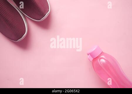 top view of water in pink color plastic bottle  Stock Photo