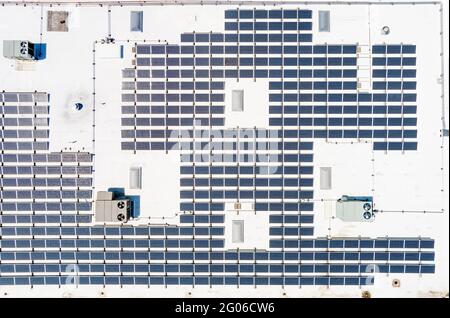 An aerial view of solar panels on the roof of house Stock Photo - Alamy