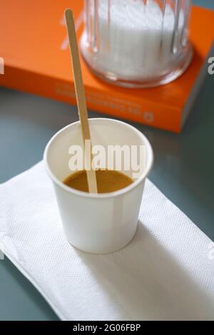 Italian espresso in a recyclable cellulose cup and recyclable wooden spoon, Italy, Europe Stock Photo