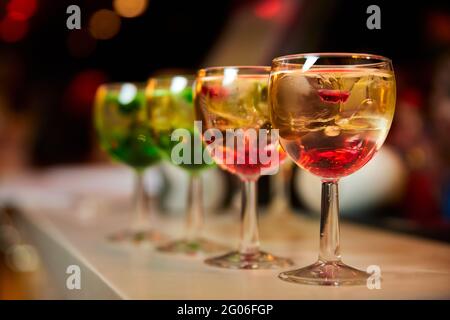 Multicolored alcoholic and non-alcoholic cocktails with ice. Stock Photo