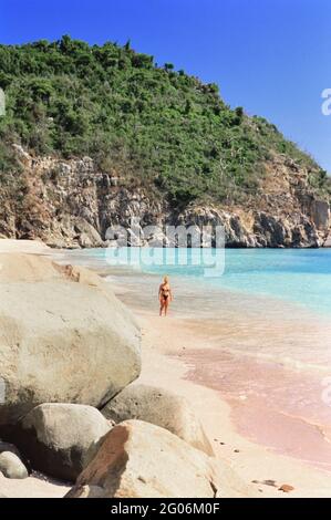 Visitors relax and play on the Anse des Grands Galets (Big Shell Beach) ca. 1998 Stock Photo