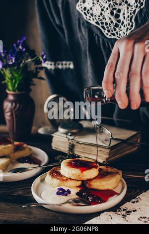 Healthy breakfast - cottage cheese pancakes, syrniki. Stock Photo