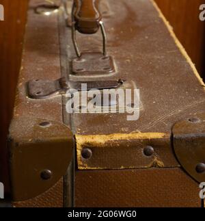 An old leather suitcase with traces of time on it Stock Photo