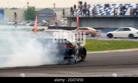 A turning black and orange car seen during the event.Festival Drift Expo  Track Mode runs on May 29-30 at ADM Raceway with the exhibition of projects  modified for drifting such as; 'Drift