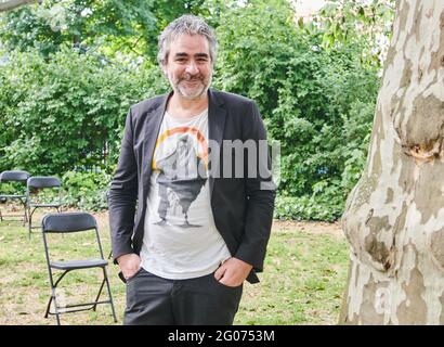 Berlin, Germany. 01st June, 2021. Deniz Yücel, journalist and publicist, stands at the opening of the exhibition 'prison no.5' in the garden of the Maxim Gorki Theater. Credit: Annette Riedl/dpa/Alamy Live News Stock Photo