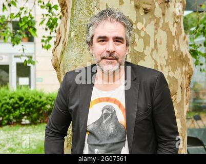 Berlin, Germany. 01st June, 2021. Deniz Yücel, journalist and publicist, stands in the garden of the Maxim Gorki Theater at the opening of the exhibition 'prison no.5'. Credit: Annette Riedl/dpa/Alamy Live News Stock Photo