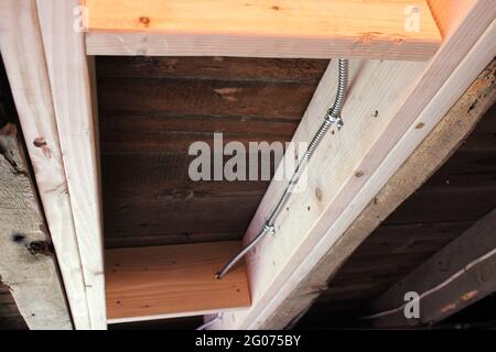 Damaged Floor Joists Sistered with New Wood for Additional Support Stock Photo