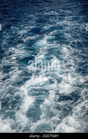 bstract of surface blue water. Abstract of surface blue water reflected with sunlight for background. Blue sea. Blue water. Water splashed use for gra Stock Photo