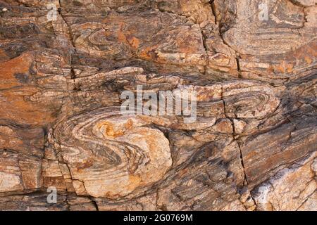 Ductiley deformed Proterozoic basement gneiss, southeastern California, USA. View is about 2 meters across. Stock Photo