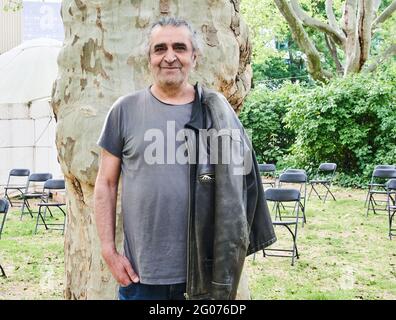 Berlin, Germany. 01st June, 2021. Artist Timur Celik stands at the opening of the exhibition 'prison no.5' in the garden of the Maxim Gorki Theater. Credit: Annette Riedl/dpa/Alamy Live News Stock Photo