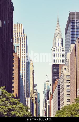 Manhattan cityscape along East 42nd Street, color toned picture, New York City, USA. Stock Photo