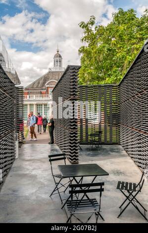 The Serpentine Gallery seen from the 2018 Serpentine Gallery Pavillion designed by Frida Escobedo. Stock Photo