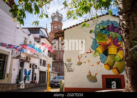 Mural celebrating Huichol Indian art on a wall in Puerto Vallarta, Mexico Stock Photo