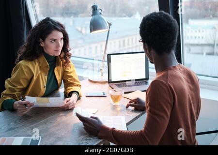 Business partners planning work together they working with documents and using laptop at office Stock Photo