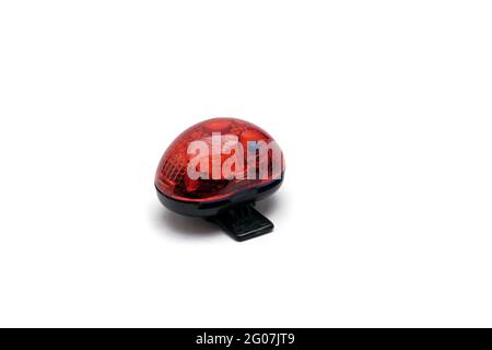 Bicycle taillight. Used bicycle taillight on an isolated white background. Selective focus. Space for text Stock Photo