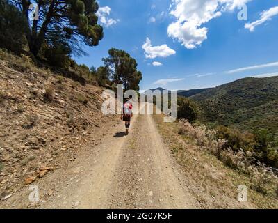 Hiking holiday along the Spanish Costa Brava coastal path, also known as the GR92 Cami de Ronda, going from Roses to Port de la Selva Stock Photo