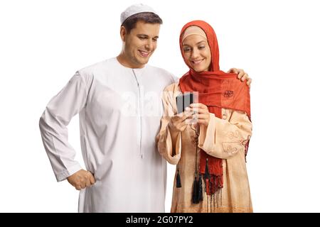 Young muslim man and woman using a smartphone isolated on white background Stock Photo