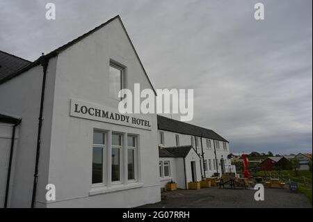 Exterior of Lochmaddy Hotel, North Uist, Outer Hebrides, Scotland showing signage and entrance. No people. Stock Photo