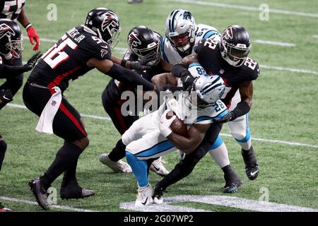 Atlanta, USA. 11th Oct, 2020. Atlanta Falcons safety Keanu Neal (22) and teammates tackle Carolina Panthers running back Mike Davis (28) in the first quarter on Sunday, Oct. 11, 2020 at Mercedes-Benz Stadium in Atlanta, Georgia. (Photo by Jason Getz/Atlanta Journal-Constitution/TNS/Sipa USA) Credit: Sipa USA/Alamy Live News Stock Photo