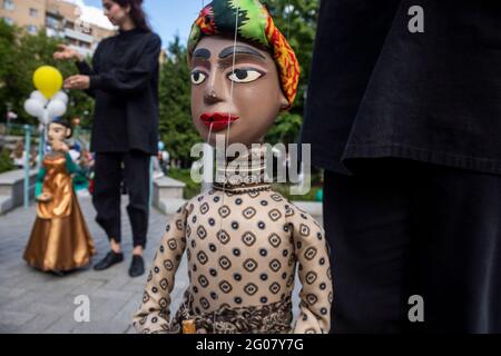Moscow, Russia. 1st June, 2021 Actors show visitors theatrical puppets during grand opening Obraztsov Park near the Obraztsov State Academic Central Puppet Theater in Moscow, Russia Stock Photo