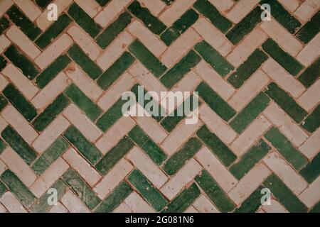Background of stripped tiled wall in white and green Stock Photo