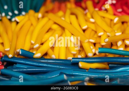 Multicolored jelly stick candies textured background Stock Photo