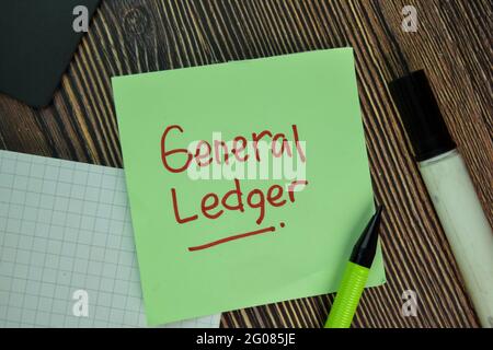 General Ledger write on sticky notes isolated on Wooden Table. Stock Photo