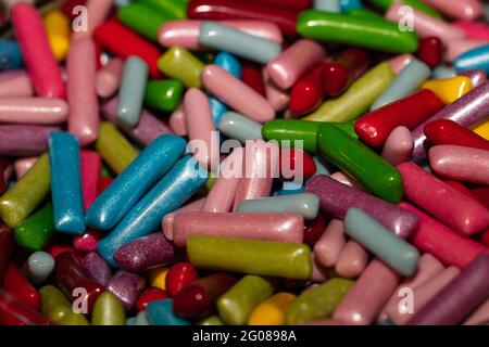 Multicolored jelly stick candies textured background Stock Photo