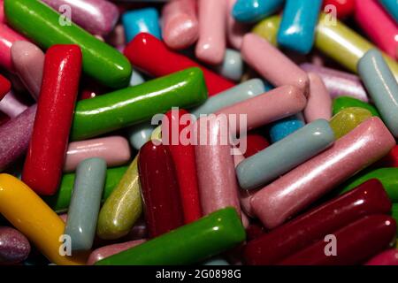 Multicolored jelly stick candies textured background Stock Photo