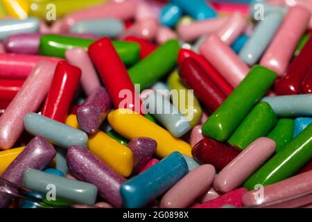 Multicolored jelly stick candies textured background Stock Photo