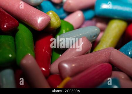 Multicolored jelly stick candies textured background Stock Photo