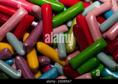 Multicolored jelly stick candies textured background Stock Photo