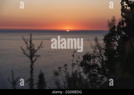 Beautiful sunset over the tropical sea in Lefkada Stock Photo