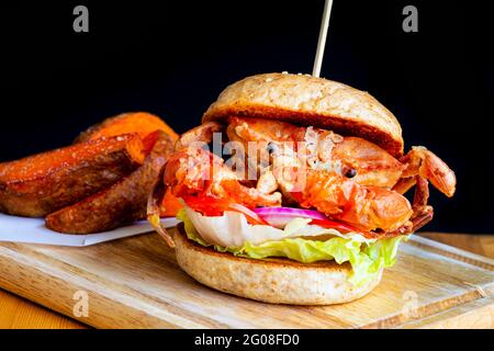 Selective focus of crab burger with chips, fusion food